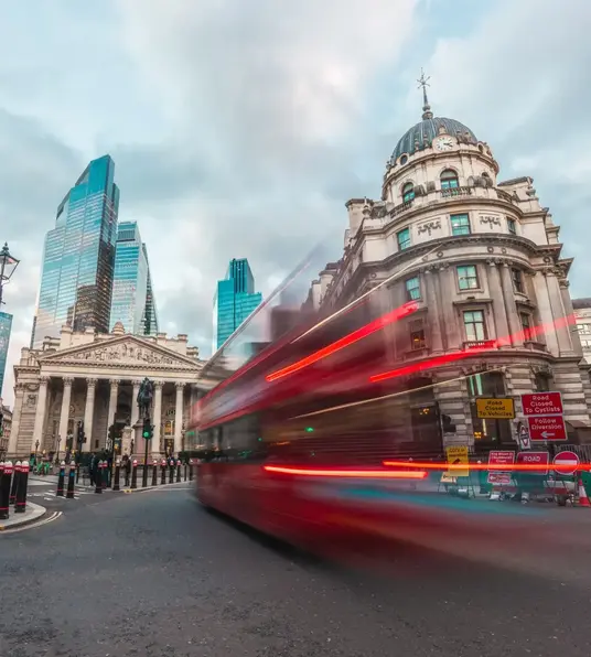 a red bus in a city